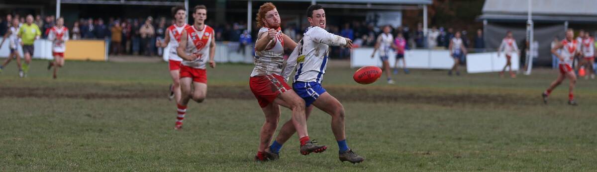 TIGHT CHECKING: Chiltern defender Brodie Oates and Yackandandah's Bailey Glass battle for possession. Picture: TARA TREWHELLA