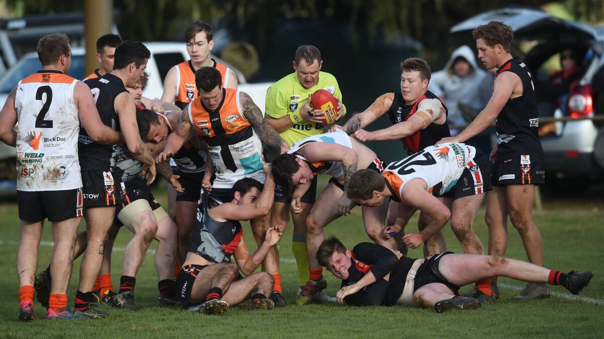 FIREWORKS: Tempers flare between Dederang Mt Beauty and Wodonga Saints at Dederang on Saturday. Picture: MARK JESSER