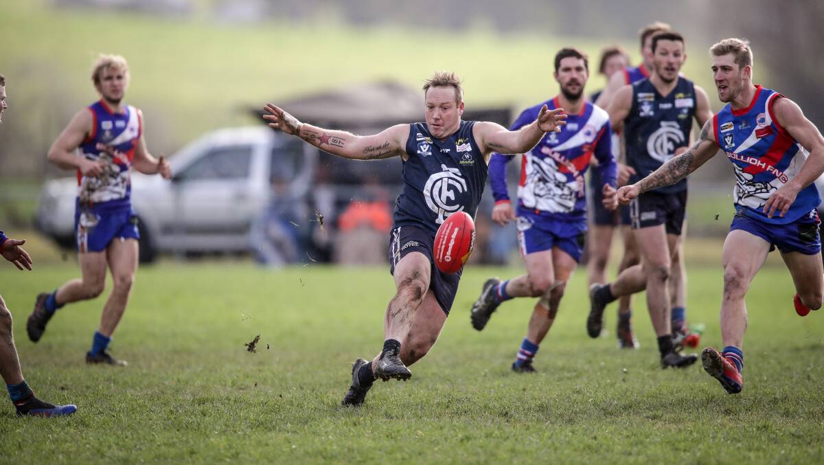 Cudgewa's Luke Bloom finds some space to drive his team forward on Saturday. The Blues look assured of finishing the season as minor premiers. Picture: JAMES WILTSHIRE