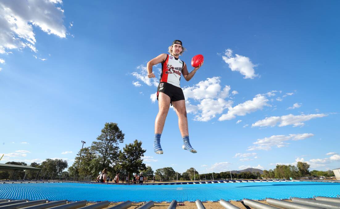 Aden Clare gets plenty of hang time on the trampoline at training recently. Picture by James Wiltshire