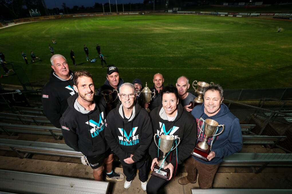 PROUD PANTHERS: Lavington's Simon Curtis, front row, left, Brian Chalmers, Sarah Senini and Ralph Aalbers with Vincent Jones (back), Tim Sanson, Stephen Chalmers, Anthony Ross and Peter Barwick.