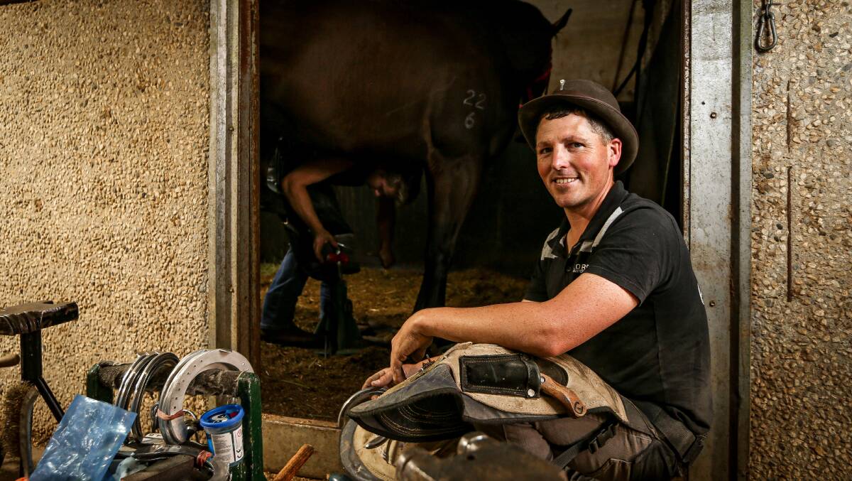 Farrier Julian Corboy was hard at work at Mitch Beer's stables on Tuesday in preparation for the Albury carnival. Picture: JAMES WILTSHIRE