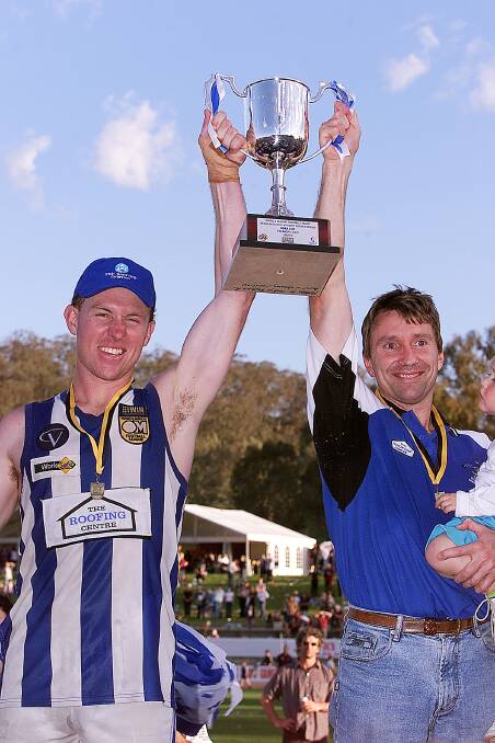 Longmire and Tossol with the 2003 premiership cup.