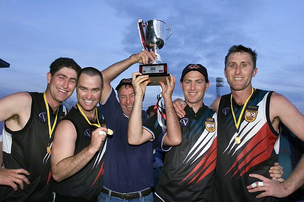 FAMILY:Paul, Brett, Ross, Mark and Tim after the Panthers' 2001 flag triumph.