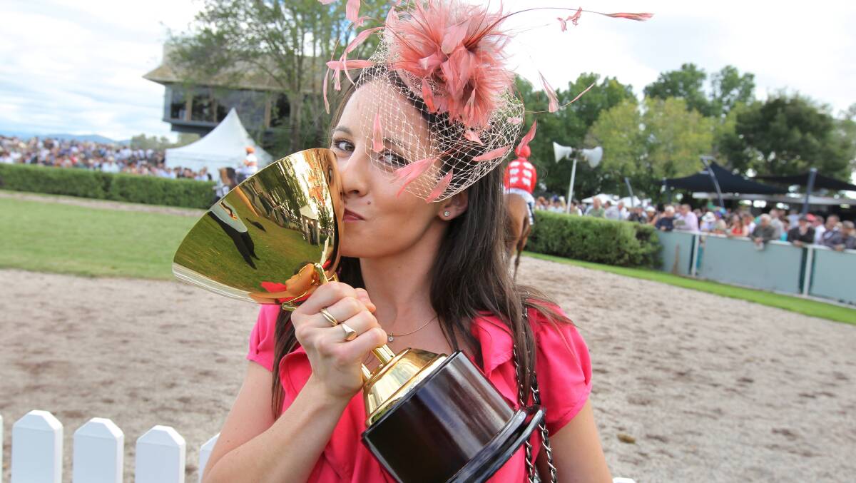 SEALED WITH A KISS: Rebecca Saunders, part-owner of Paddy O'Reilly, with the 2011 Gold Cup. Paddy O'Reilly was the catalyst for the cup gaining listed status.