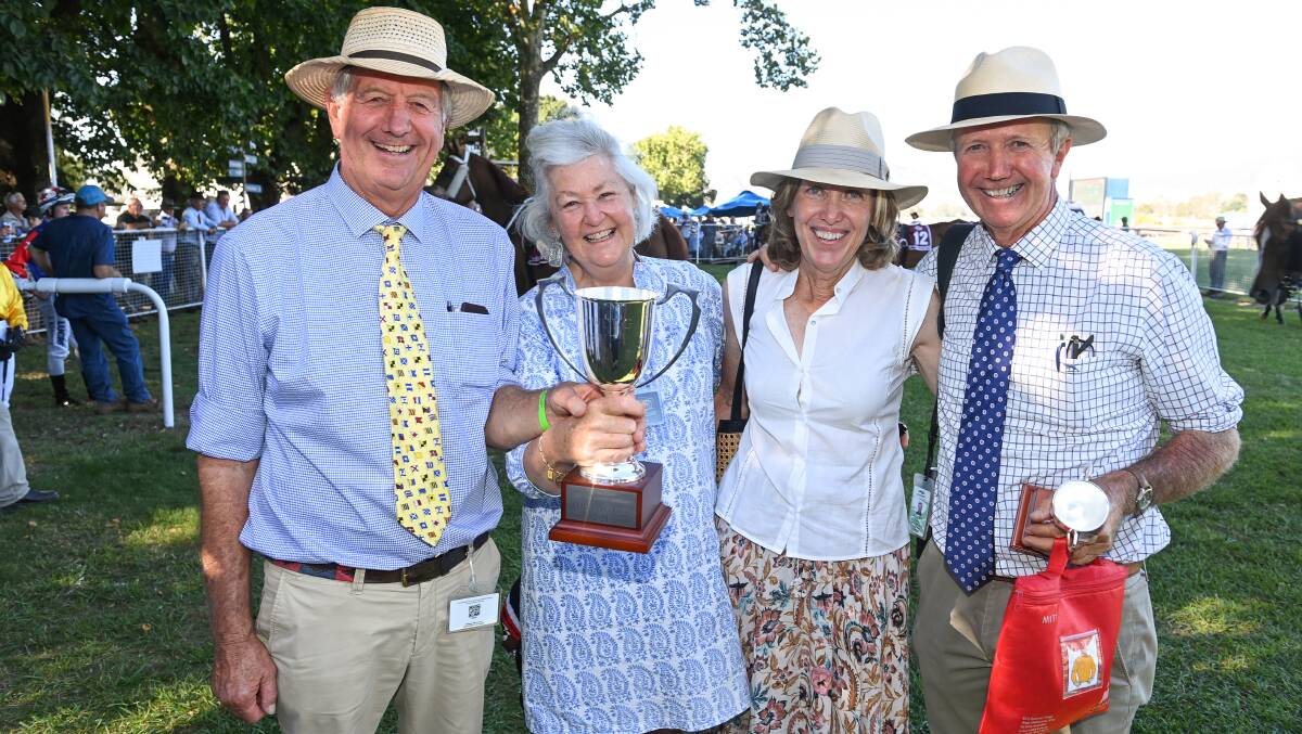 WINNERS ARE GRINNERS: Owners of Sizzlingonthebeach Simon Doats, Clay Fair, Jane and Rodger Waters with the spoils of victory.