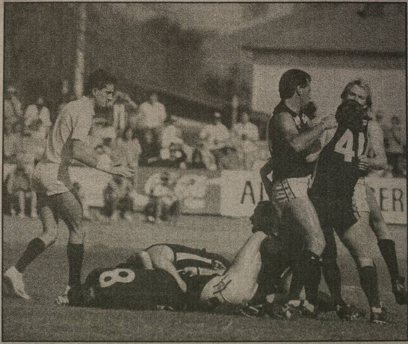 Stephens (41) and Wayne Pendergast tangle during the Bloodbath grand final.