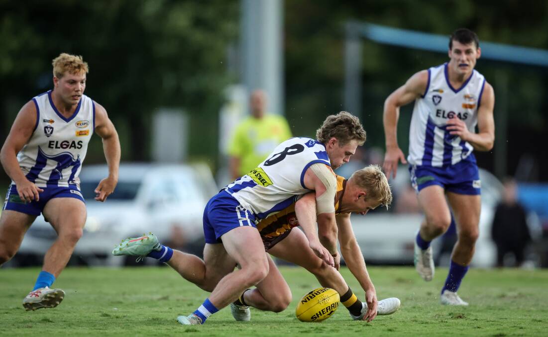 Reigning Hawks best and fairest winner Jack Haugen and Roo onballer Hamish McInnes battle for possession. Picture by James Wiltshire