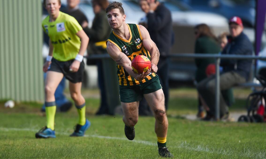 Tallangatta Valley's Joel O'Connell in action against Mitta United on Saturday.