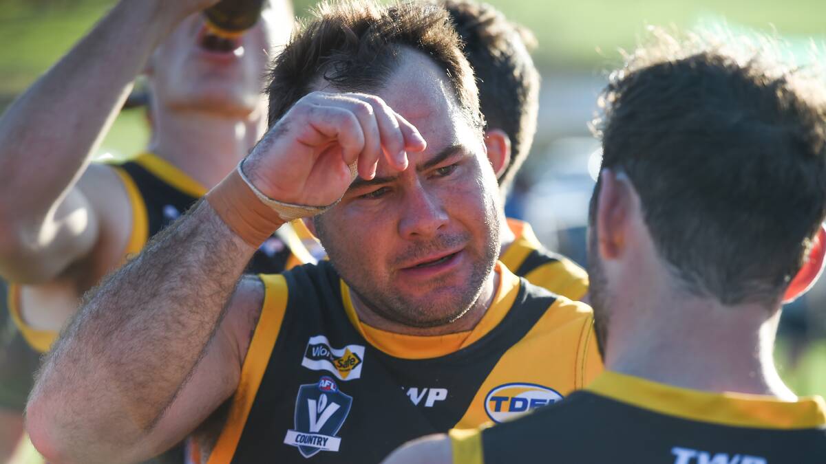CHANGING OF THE GUARD: Peter Cook stepped down as coach of the Tigers last month but the star forward is set to remain as a player.