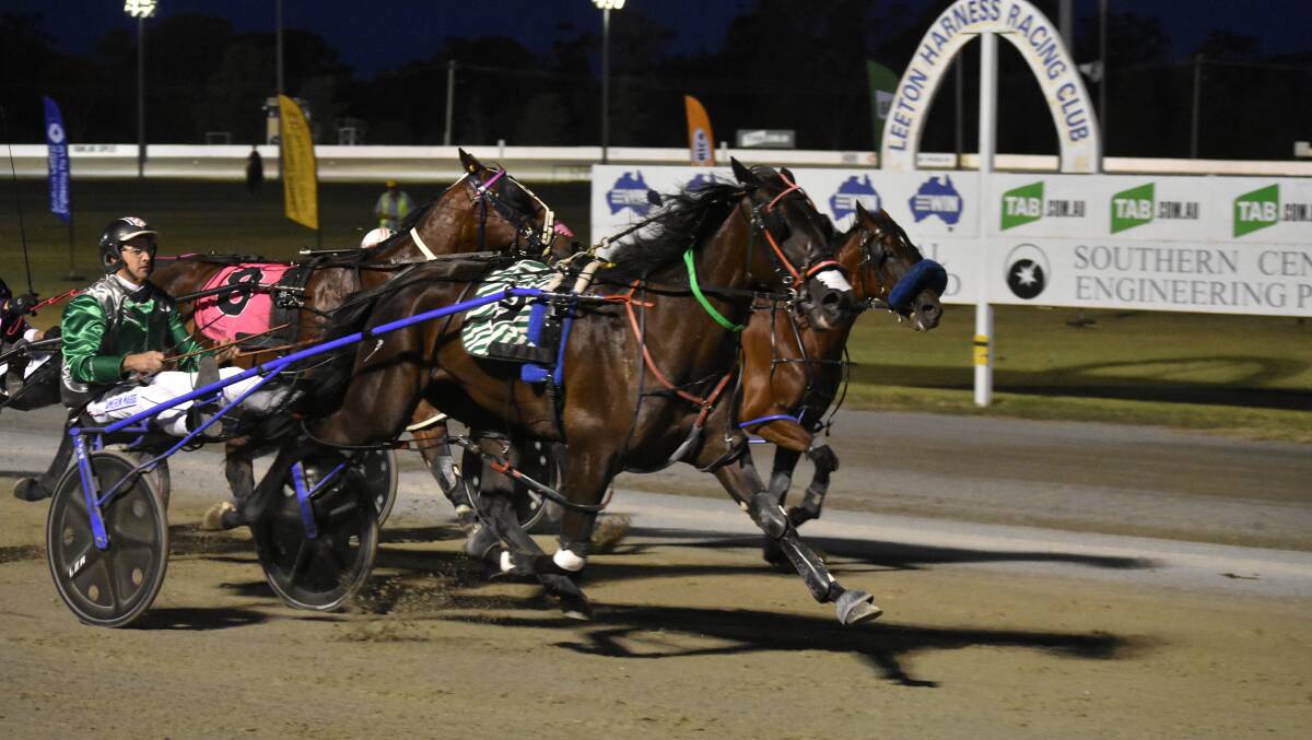 TOO STRONG: The Ian Livermore-trained Carla Clare surges late to claim the Leeton Pacers Cup with Cameron Maggs in the sulky. Picture: DAILY ADVERTISER