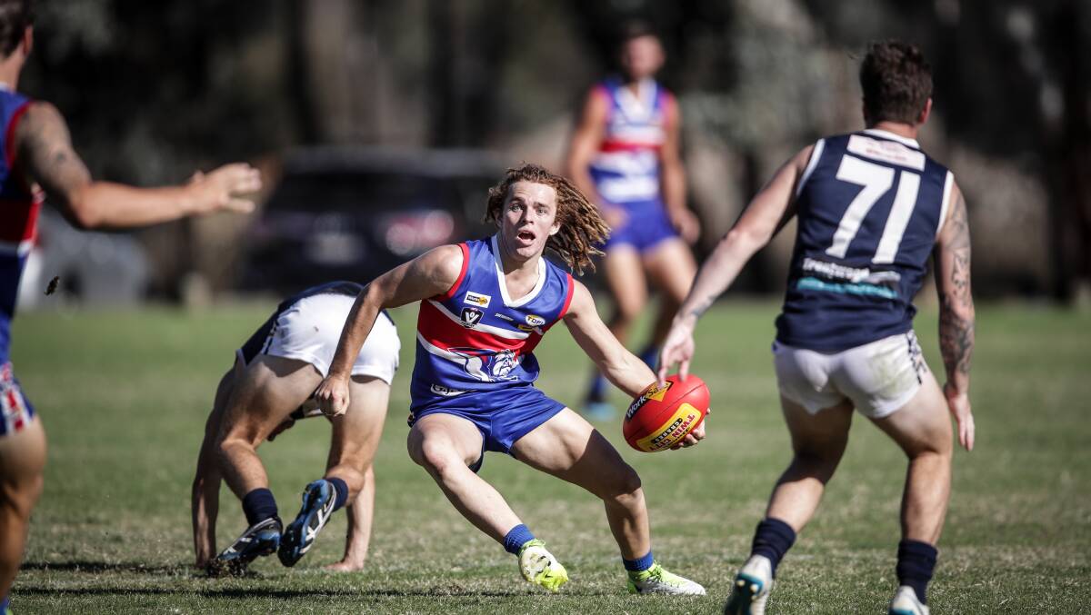 CANDY MAN: Thurgoona's Tom Rake sells some candy against Mitta United last weekend. Picture: JAMES WILTSHIRE