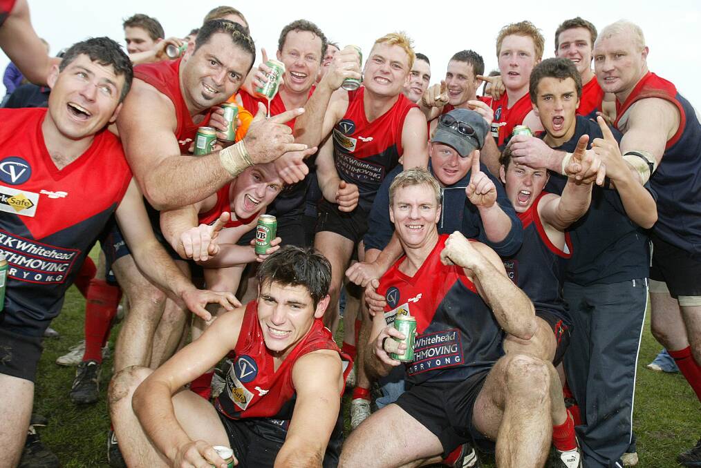 Corryong players celebrate their 2005 flag triumph.