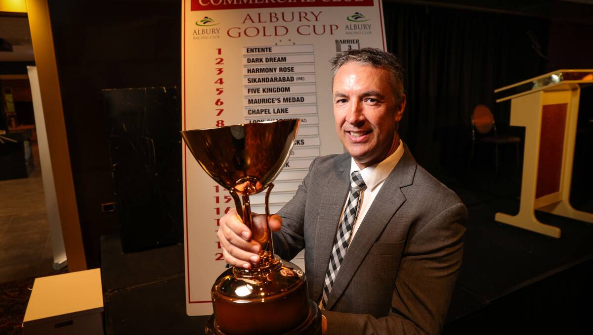 CUP FEVER: Albury Racing Club boss Steve Hetherton with the Albury Gold Cup yesterday. There are 12 runners set to contest the $200,000 feature. Picture: JAMES WILTSHIRE