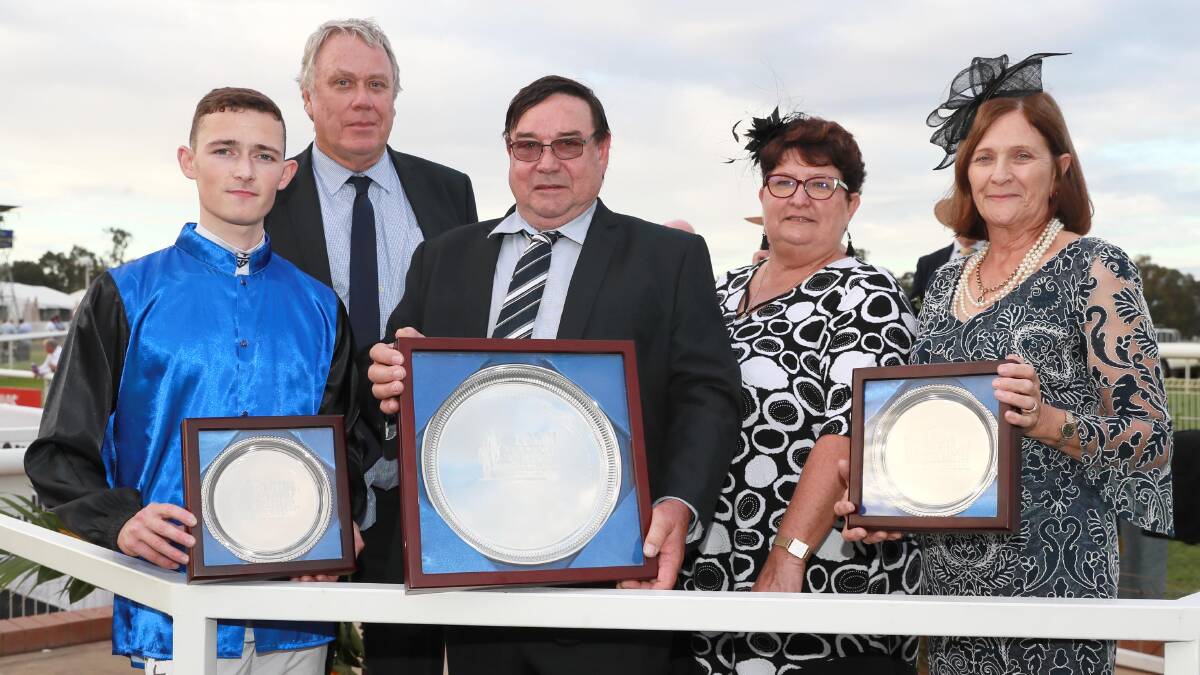 PLATE PARTY: Winning jockey Tommy Sherry with connections Paul and Barbara Wagner and Greg and Elaine Sturgiss. Picture: Les Smith