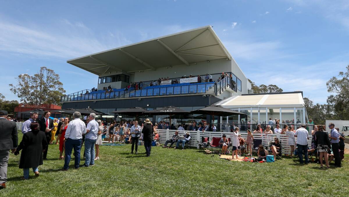 CUP DAY: The crowd at Wangaratta at its recent Melbourne Cup day meeting. The new grand stand in the background was part of the $6.5 million plus redevelopment which was officially opened in October.