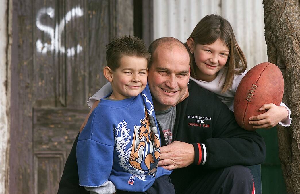 FAMILY MAN: Cornell with his children Dylan and Brittany in 2003.