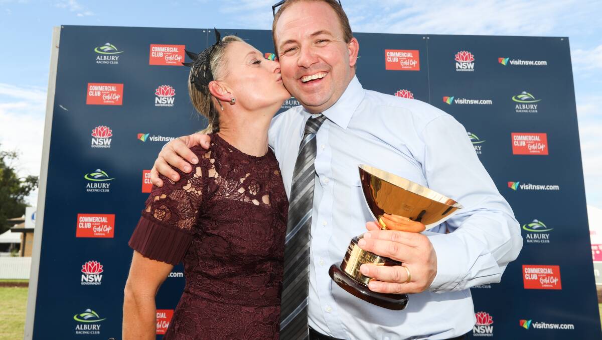 SPOILS OF VICTORY: Trainer Craig Widdison receives a congratulatory kiss off his wife, Kelly, after Willi Willi won the 2018 Gold Cup. Widdison and Willi Willi are aiming for back-to-back cups today.
