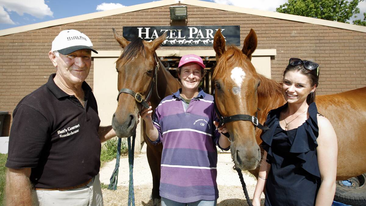 FINGERS CROSSED: Graham Hulm with Donna Scott and her daughter Danielle Scott. The trio will be hoping Hail The Hero can secure a Championship berth at Wagga on Tuesday.