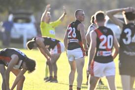 Howlong and Brock-Burrum players show their disbelief after their match ended in a draw at Burrumbuttock on Saturday. Picture by Mark Jesser