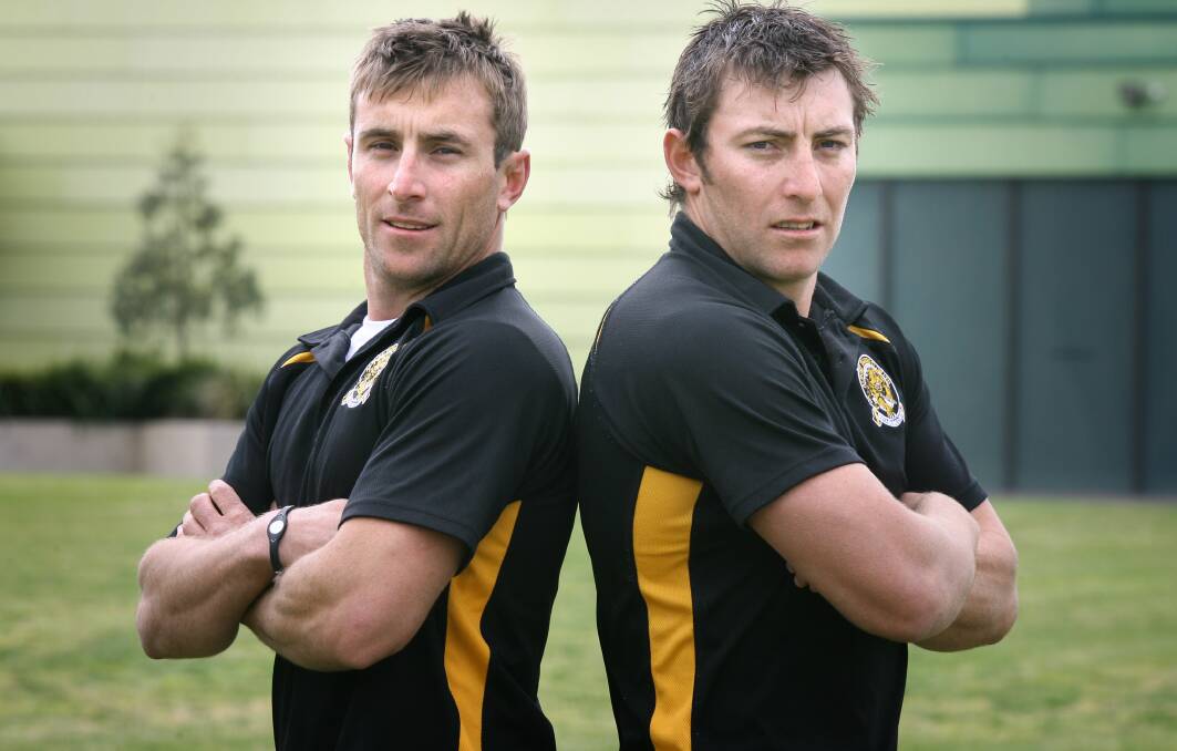 Maher and his brother Josh in 2010.