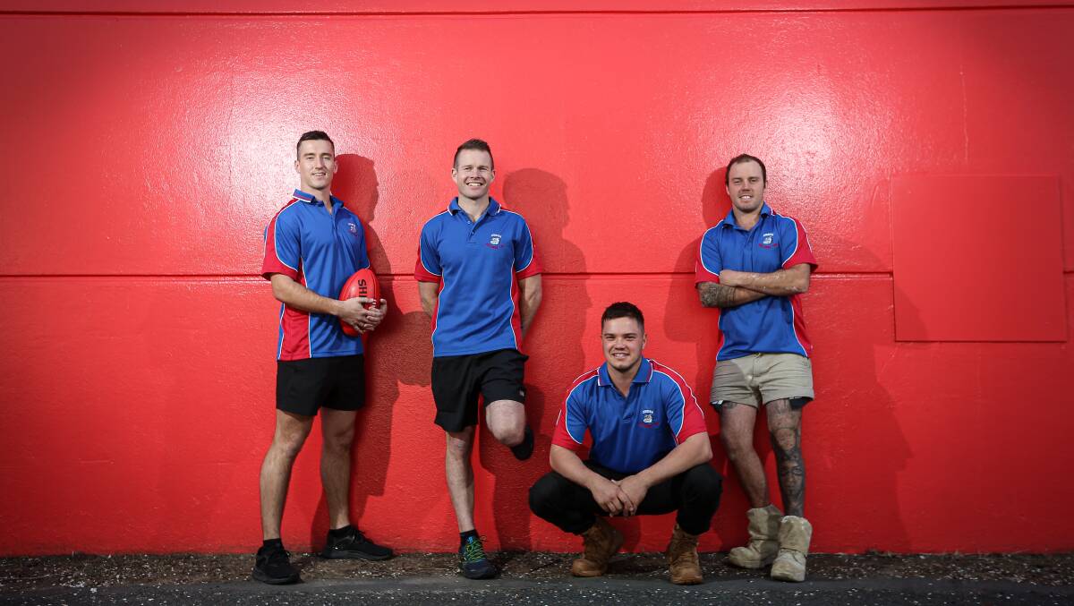 Wilson with recruits Alex Rowe, Lachie Dight and AJ Middleton in 2021.