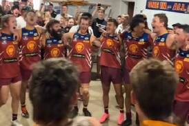 Jubilant Wahgunyah players belt out the club song for the first time in almost three years on Saturday.