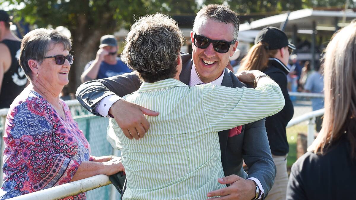 WELL DONE: Steve Hetherton congratulates trainer Donna Scott on making a third successive Country Championship final with Bennelong Dancer.