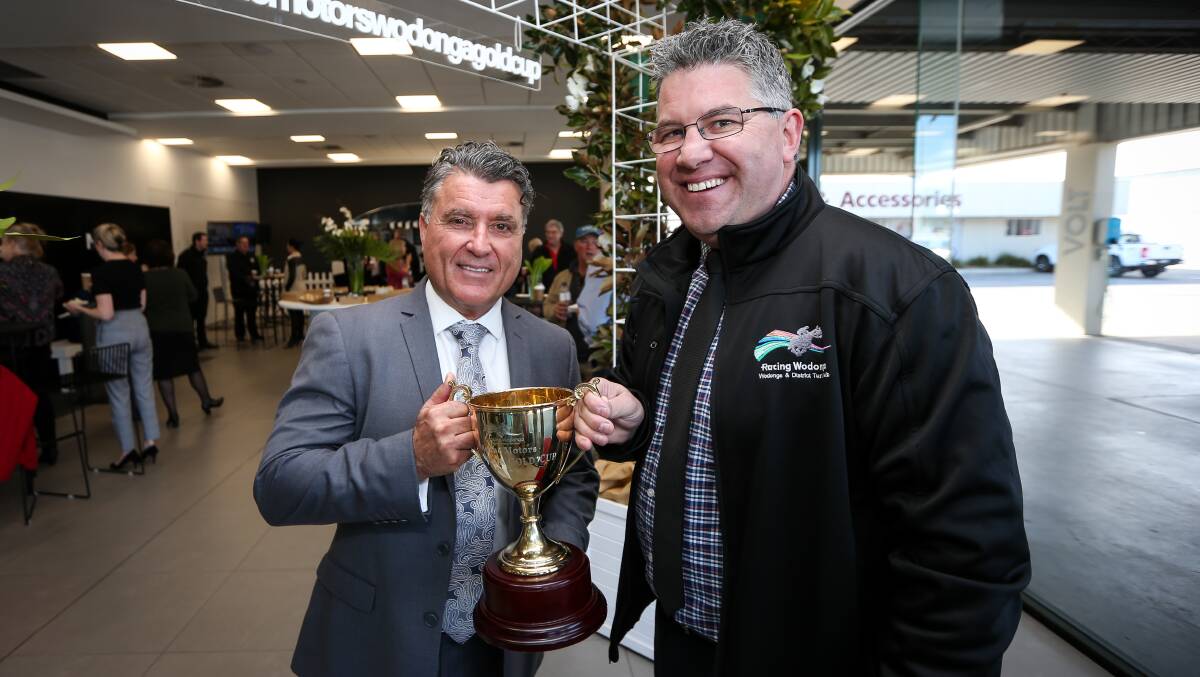 CUP COUP: Mick Blomeley from McRae Motors and WDTC general manager Tom O'Connor with the cup at the Wodonga Gold Cup launch yesterday. Picture: JAMES WILTSHIRE