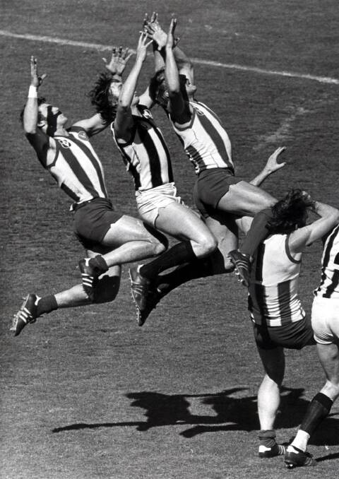 Malcolm Blight in action for North Melbourne.