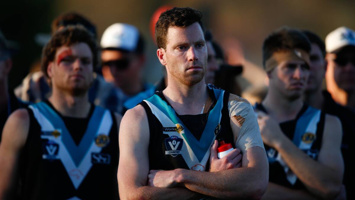 TOUGH LOSS: James Saker after the Panthers' grand final loss against Albury in 2015.