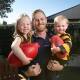 Kiewa-Sandy Creek co-captain Jack Andrew with his kids Norah, 3, and Myles, 2. Picture by James Wiltshire