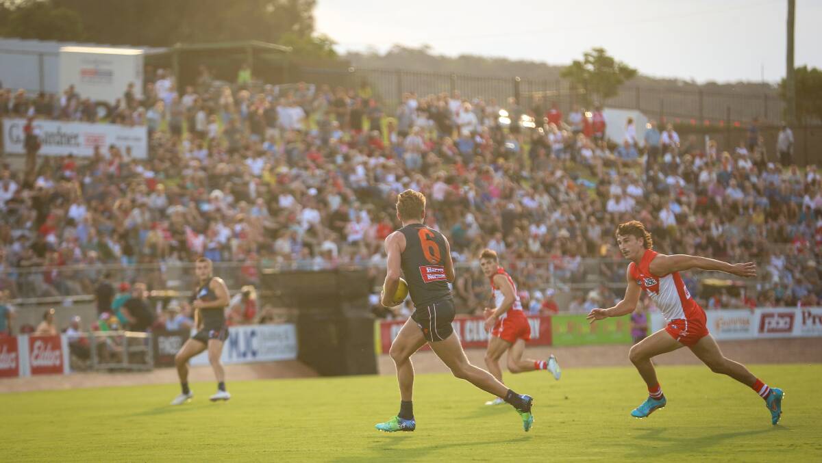 BIG CROWD: More than 7000 fans turned up to the Lavington Sports Ground on Friday night to watch the AFL practice match between GWS Giants and Lavington.