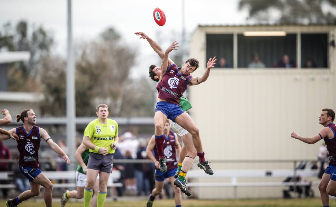 Culcairn's James Pitson and Holbrook's Randal Taylor contest a hit-out at Culcairn on Saturday. Picture: JAMES WILTSHIRE