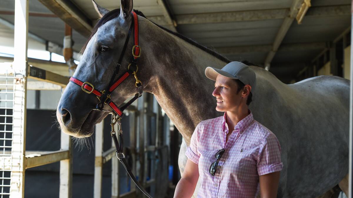 FAMILY AFFAIR: Ash Beer with What A Hoot. Beer's brother, Mitch, will target the Sapphire Coast carnival over the weekend with seven runners. Picture: MARK JESSER