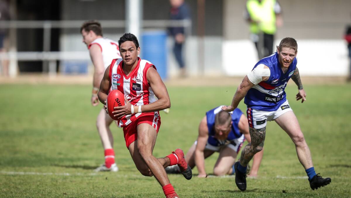 SPEEDSTER: Dale Cox in action for Henty in 2019. The speedster has joined Wodonga Raiders and is set to add plenty of run and carry from defence.
