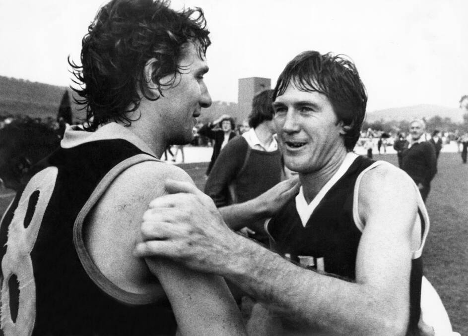 Albury's Tom Doolan and Wodonga's David McLeish after the 1981 grand final the Bulldogs won.