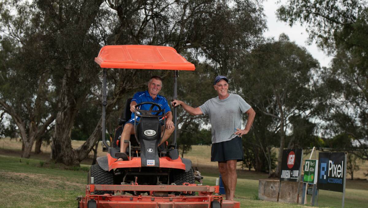Trevor Freeman and Peter Penny spend plenty of hours on the mower each week helping to maintain the golf course. Picture by Tara Trewhella