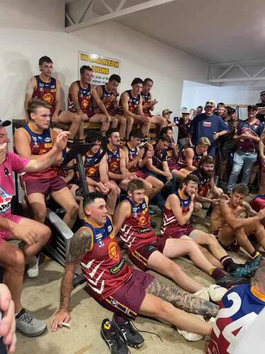 The players in the clubrooms on the weekend after their drought-breaking win.