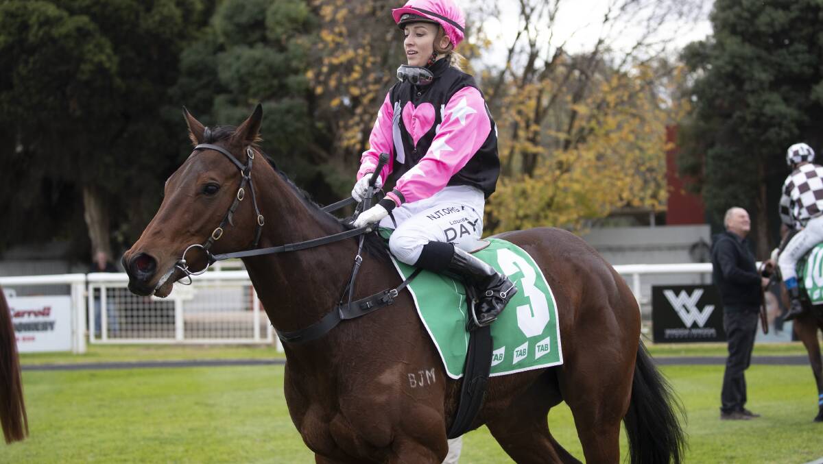 HAPPY DAYS: Louise Day returns a winner on Distillate at Murrumbidgee Turf Club on Tuesday. Picture: Madeline Begley