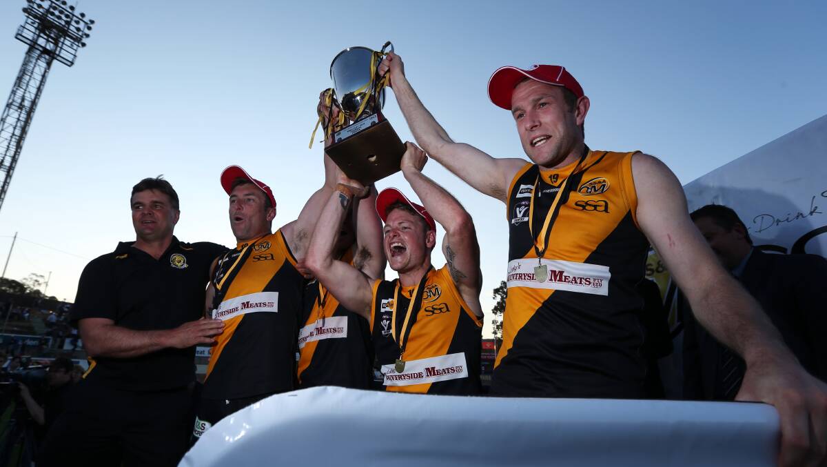 Maher with the 2014 premiership cup.