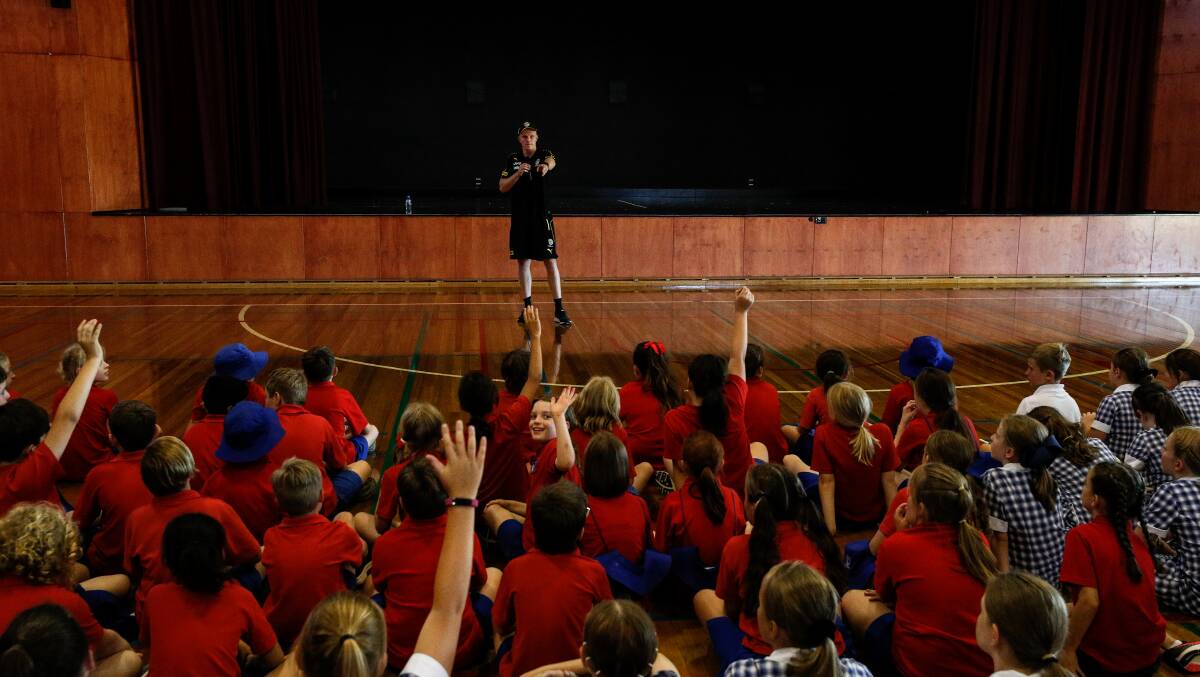 QUESTION TIME: Students from Victory Lutheran College in Wodonga had plenty of questions for Tiger Ryan Garthwaite when he visited the school on Monday.