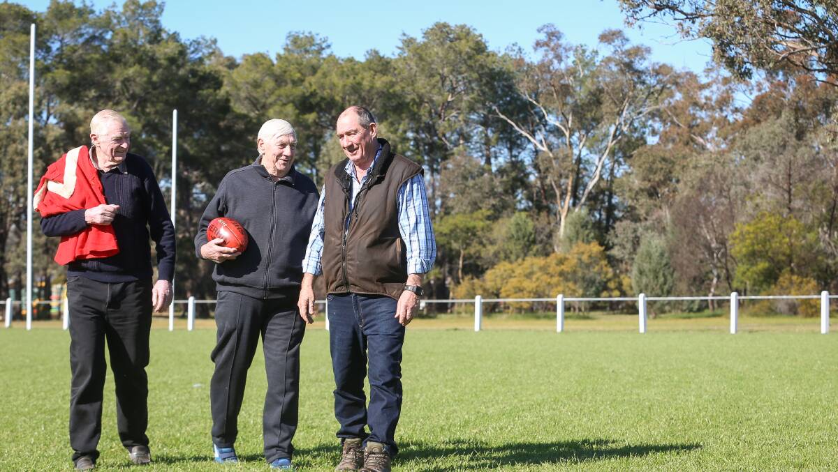 Ken Lindner, Bill Barton and Tom Doolan take a stroll on their former home ground at Burrumbuttock. 