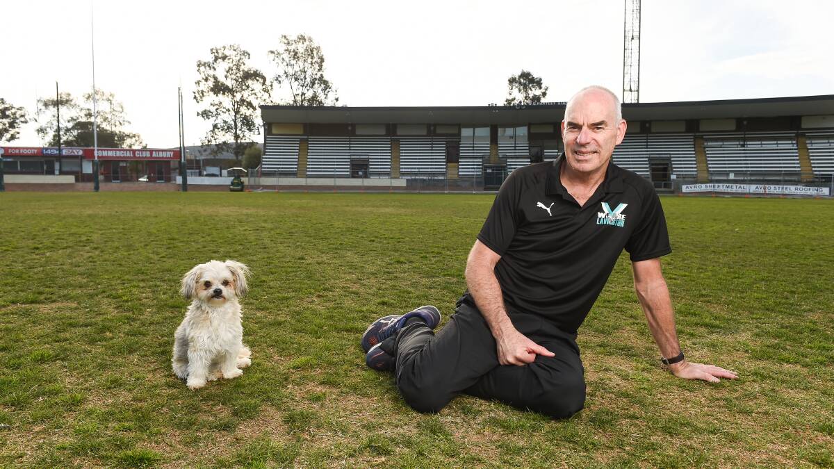 OVER AND OUT: Peter Barwick and his dog, Lola, at Lavington Sportsground during the week. Picture: MARK JESSER