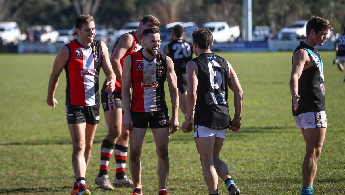 YOUNG GUNS: Myrtleford's Lachie Dale and Lavington's Shaun Mannagh discuss who has had the better season. Picture: JAMES WILTSHIRE