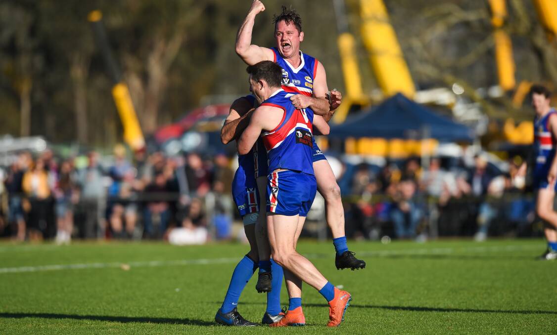PARTY TIME: Thurgoona's Jayden Kotzur celebrates one of his three goals in the grand final against Barnawartha.