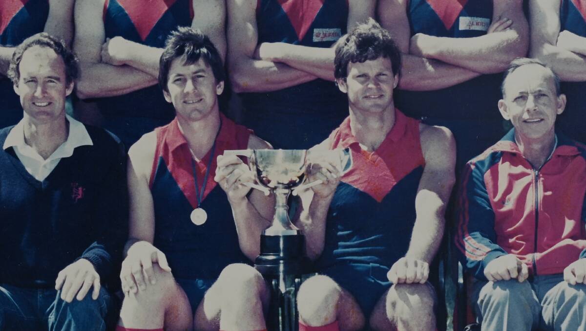 Hollands led the Wodonga Demons to the flag in 1987 to become their inaugural premiership coach.