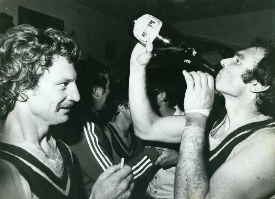 John Smith and Col Trevaskis celebrate North Albury's 1980 flag triumph.