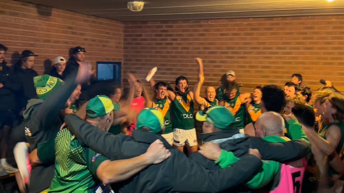North Albury players and officials belt out the club song on the weekend.