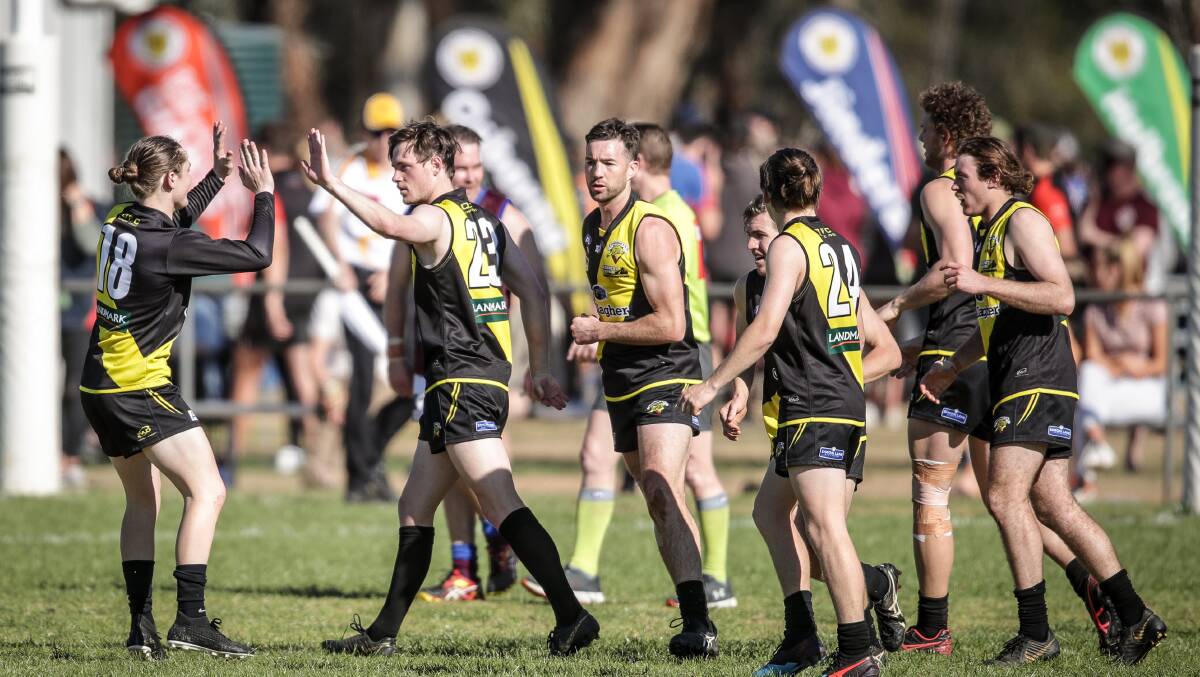 YOUNG GUN: Connor Galvin (second left) celebrates one of his five goals in the preliminary final last weekend. Picture: JAMES WILTSHIRE